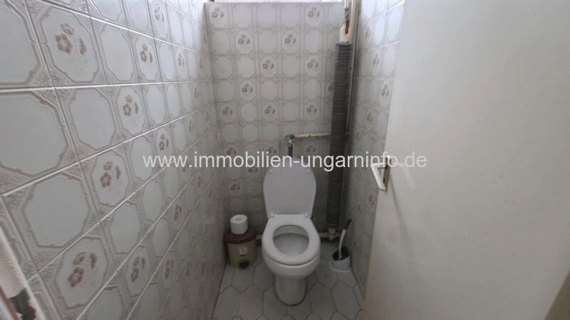 Mehrgenerationen-Einfamilienhaus mit Geschäftsraum in Marcali zu verkaufen