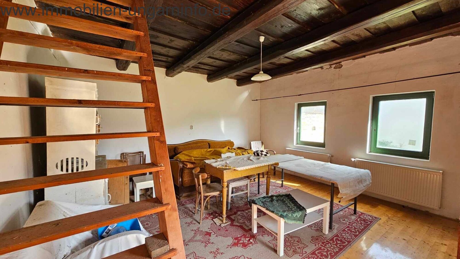 Restauriertes hundertjähriges Bürgerhaus an der Drau