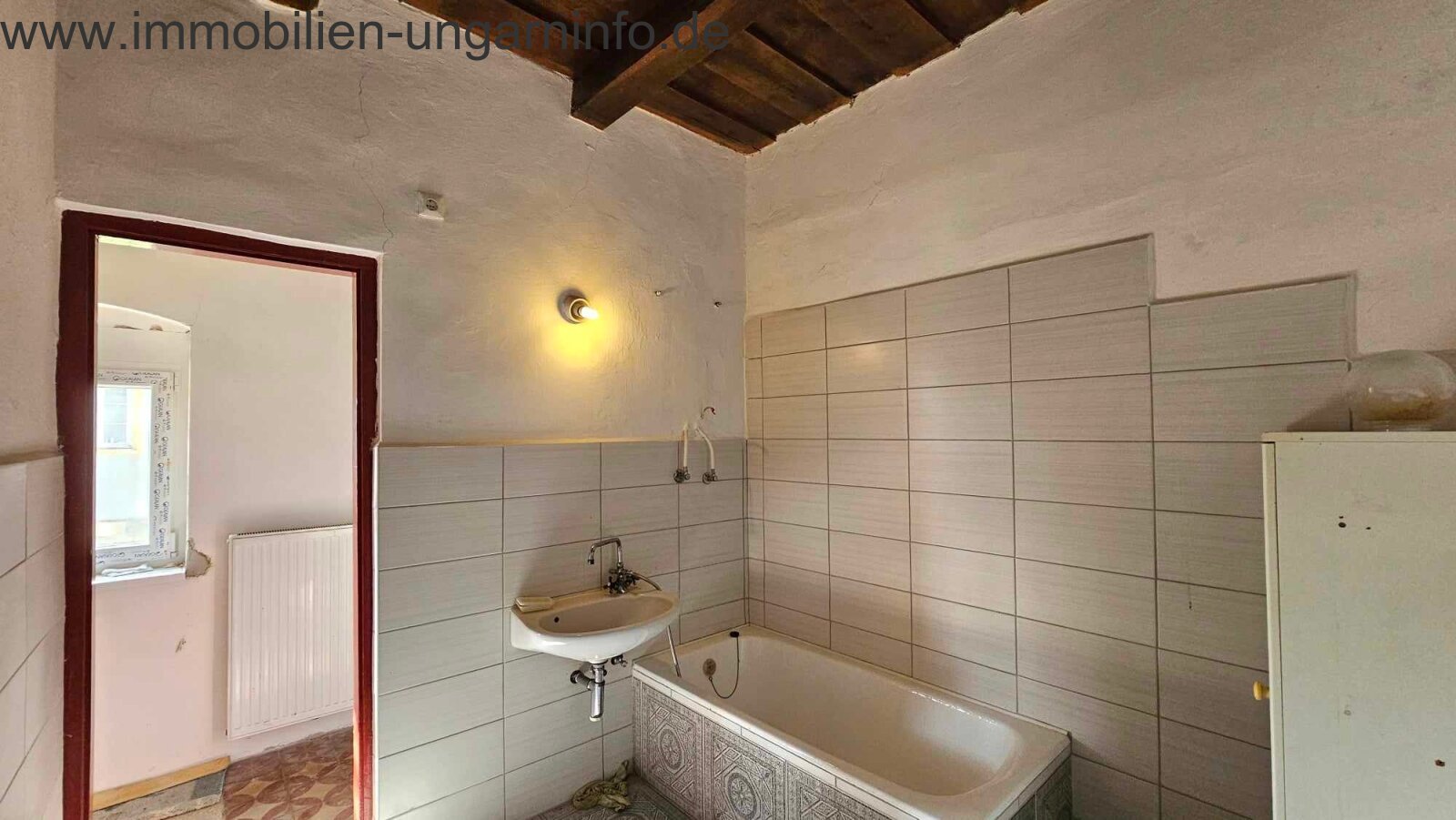 Restauriertes hundertjähriges Bürgerhaus an der Drau